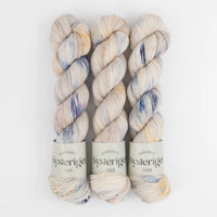 Sysleriget hand dyed yarn in single ply merino wool in the color Blueberry Swirl.