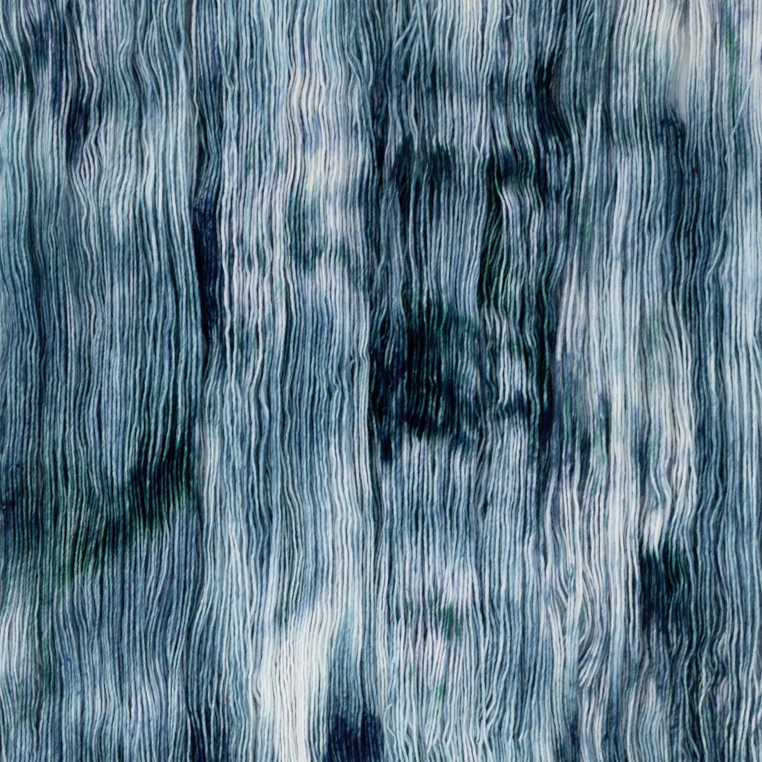 Sysleriget hand dyed yarn in single ply merino wool in the color Sea Glass.