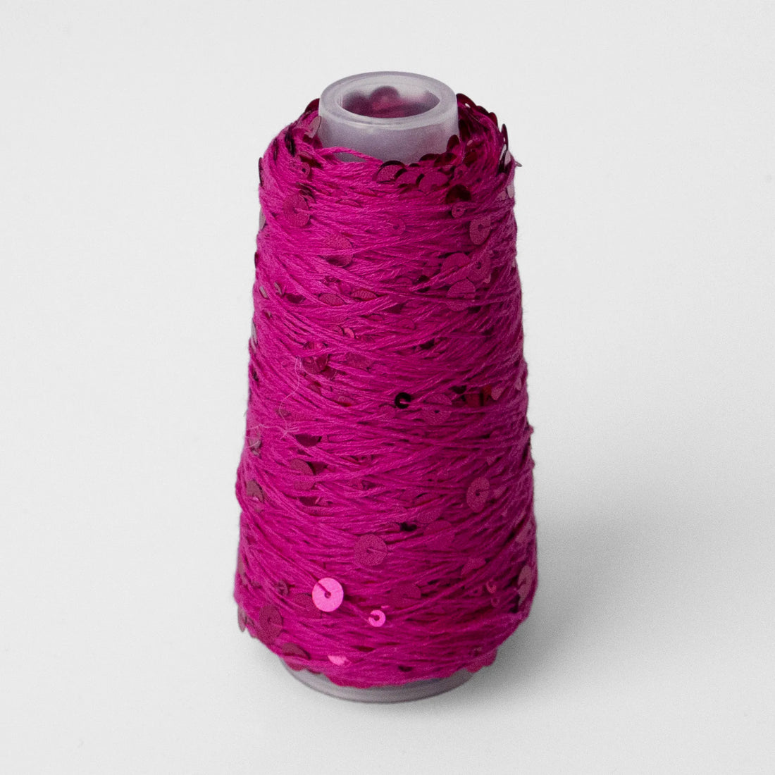 Sysleriget Sequins yarn on cotton base in the color 50 Mørk Pink.