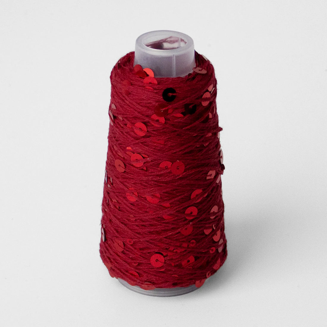 Sysleriget Sequins yarn on cotton base in the color 28 Rød.