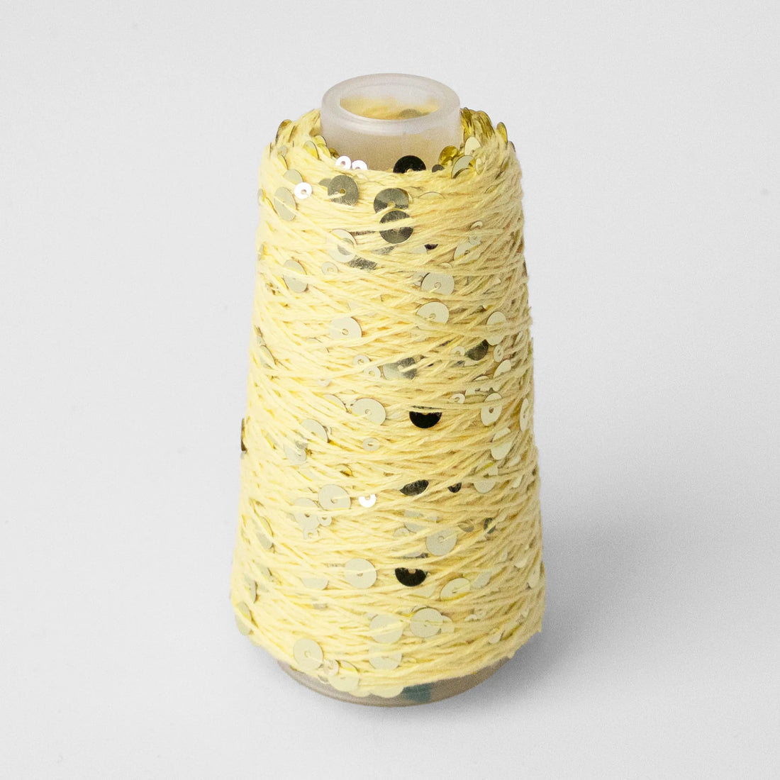 Sysleriget Sequins yarn on cotton base in the color 33 Gul.